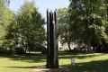 Au crépuscule|Au crépuscule 2006, Chêne traité 4 figures extraites d'un même arbre 5,9 x 2 x 2 m<div>Jardin Botanique</div>