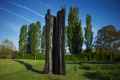 La lumière en écho|2013, 2 figures issues d'un même chêne, bois traité, 620 X 300 X 200 cm<br />Collection Château de Vullierens